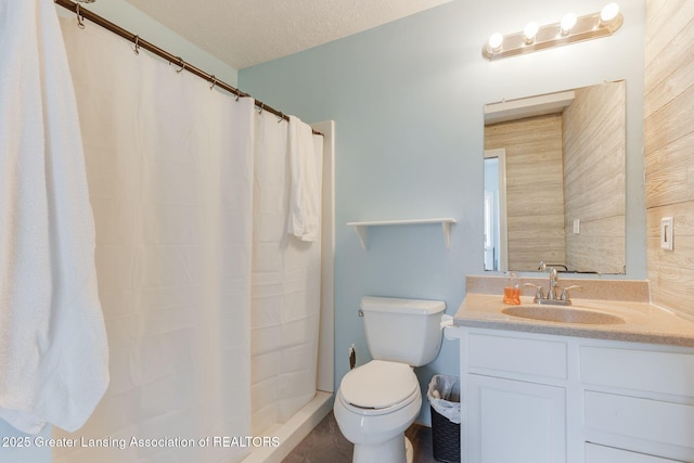 309 W Plain St, Eaton Rapids, MI 48827 - bathroom with toilet, vanity, a textured ceiling, and a shower with curtain