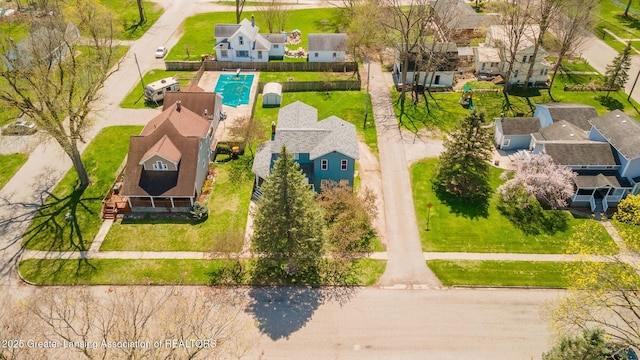 309 W Plain St, Eaton Rapids, MI 48827 - aerial view of residential area featuring a pool area