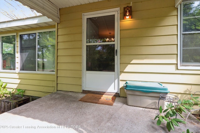 3105 Allen Ln, Harrison, MI 48625 - property entrance featuring a patio