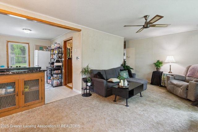 3105 Allen Ln, Harrison, MI 48625 - carpeted living room with crown molding and ceiling fan