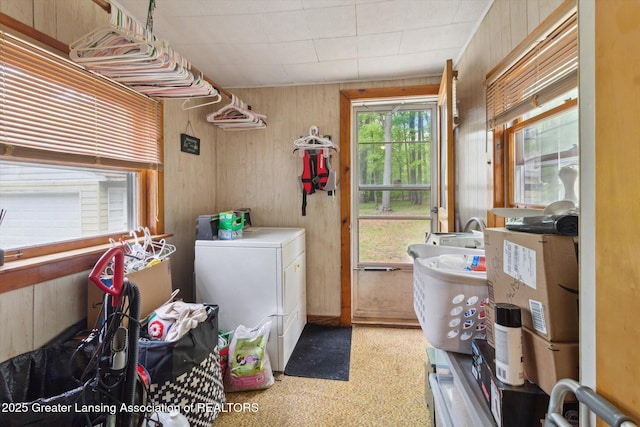 3105 Allen Ln, Harrison, MI 48625 - laundry area featuring wooden walls and washer and dryer