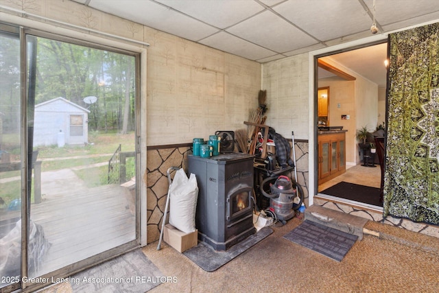 3105 Allen Ln, Harrison, MI 48625 - doorway with a paneled ceiling and a wood stove