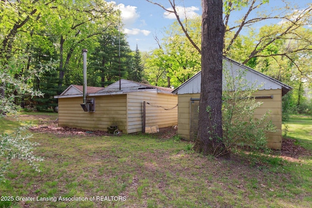 3105 Allen Ln, Harrison, MI 48625 - view of yard featuring an outbuilding