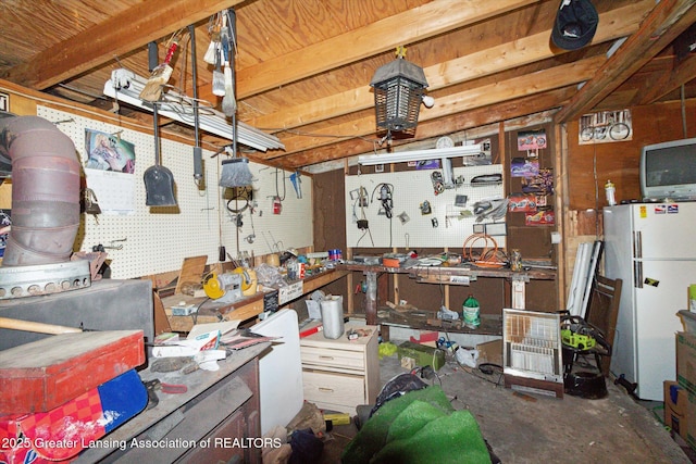 3105 Allen Ln, Harrison, MI 48625 - miscellaneous room with a workshop area and concrete floors