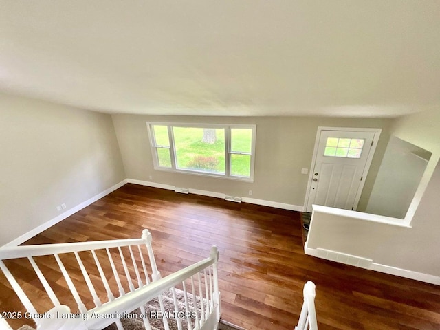 4408 Arbor Dr, Okemos, MI 48864 - foyer featuring baseboards and wood finished floors
