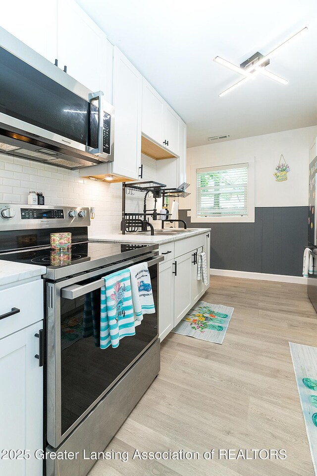 1208 Victor Ave, Lansing, MI 48911