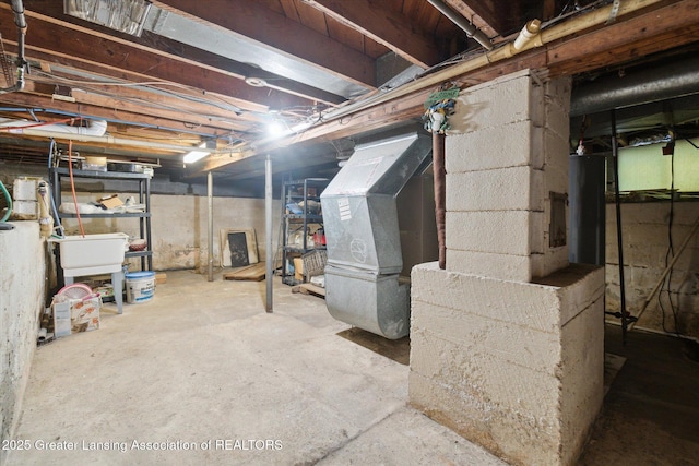 3804 Glenwood Ave, Lansing, MI 48910 - unfinished below grade area featuring a sink