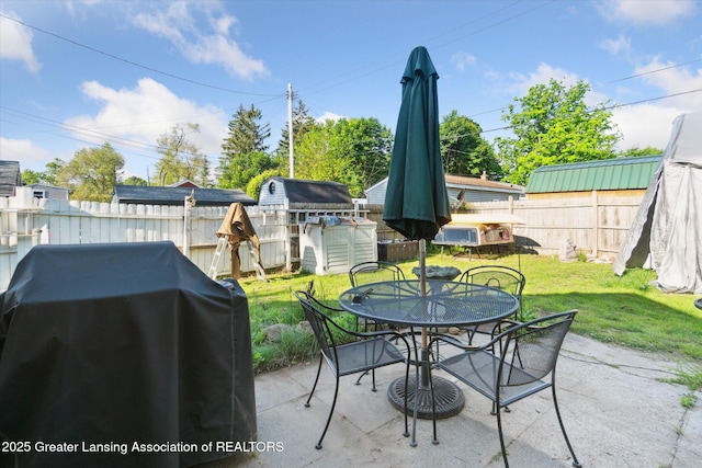3804 Glenwood Ave, Lansing, MI 48910 - view of patio / terrace featuring outdoor dining space and area for grilling