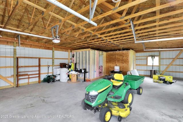 3115 Dietz Rd, Williamston, MI 48895 - garage with a garage door opener