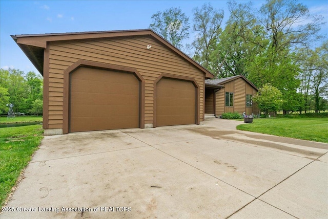 4582 N Watson Rd, Elsie, MI 48831 - view of front of property featuring concrete driveway and a front lawn