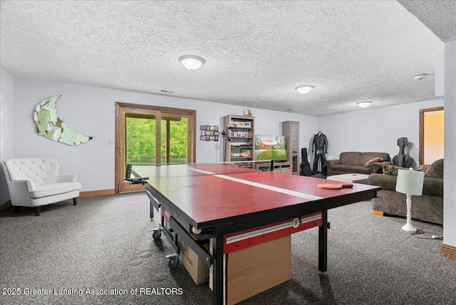 4582 N Watson Rd, Elsie, MI 48831 - recreation room with carpet, baseboards, and a textured ceiling