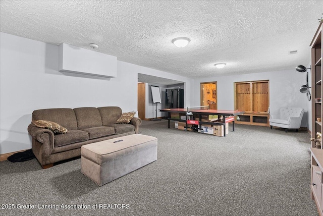 4582 N Watson Rd, Elsie, MI 48831 - living area featuring carpet floors, a textured ceiling, and baseboards