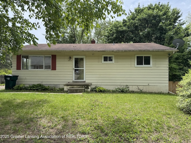3425 Cooley Dr, Lansing, MI 48911 - single story home with a chimney
