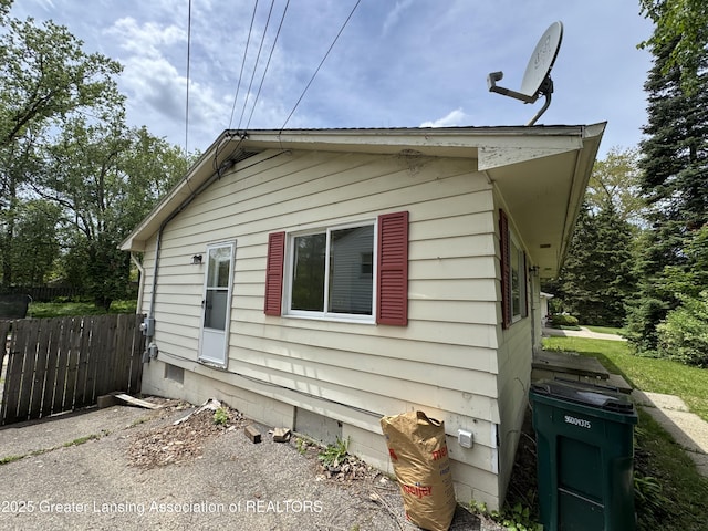 3425 Cooley Dr, Lansing, MI 48911 - view of property exterior featuring crawl space
