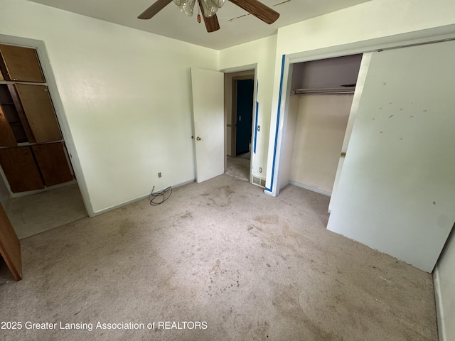 3425 Cooley Dr, Lansing, MI 48911 - unfurnished bedroom with carpet floors, a closet, and ceiling fan