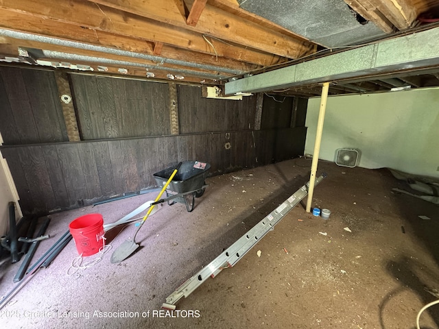3425 Cooley Dr, Lansing, MI 48911 - unfinished below grade area featuring wood walls