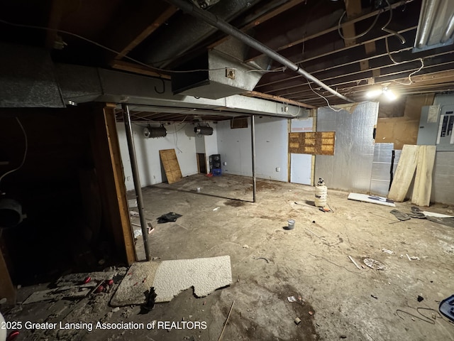 3425 Cooley Dr, Lansing, MI 48911 - unfinished below grade area featuring electric panel