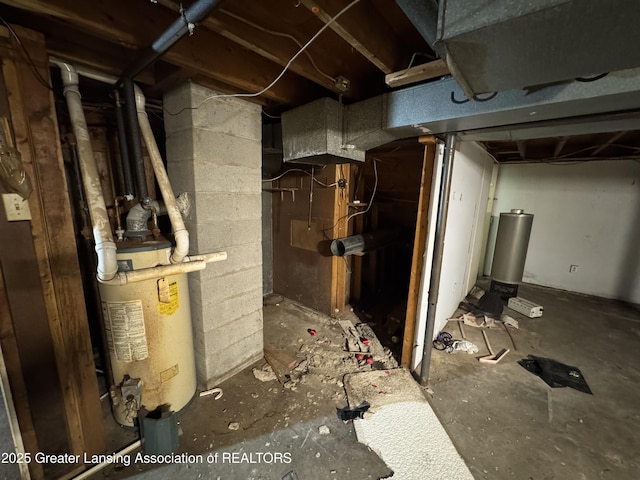 3425 Cooley Dr, Lansing, MI 48911 - unfinished below grade area featuring water heater