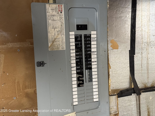 3425 Cooley Dr, Lansing, MI 48911 - utility room featuring electric panel