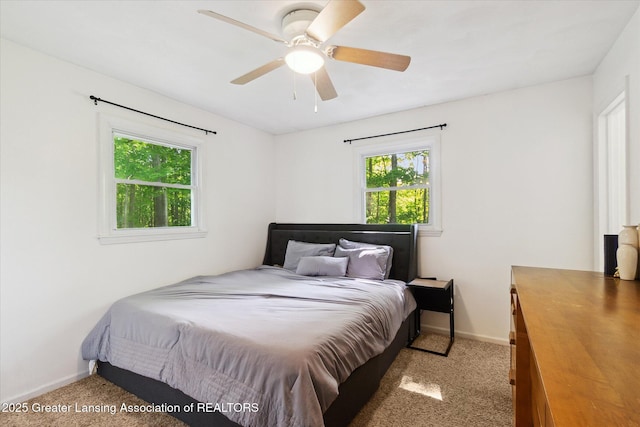 248 Gale Rd, Mason, MI 48854 - carpeted bedroom featuring baseboards and a ceiling fan
