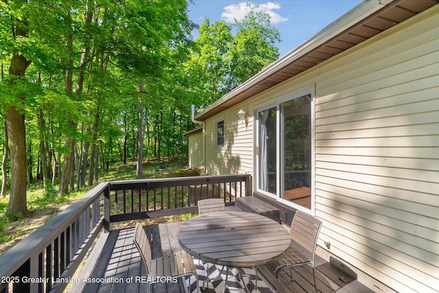 248 Gale Rd, Mason, MI 48854 - wooden terrace with outdoor dining area