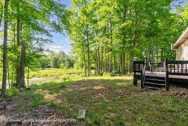 248 Gale Rd, Mason, MI 48854 - view of yard with a deck