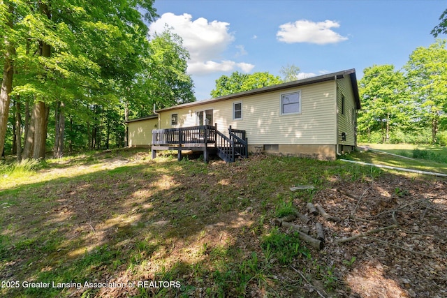 248 Gale Rd, Mason, MI 48854 - rear view of house with a wooden deck
