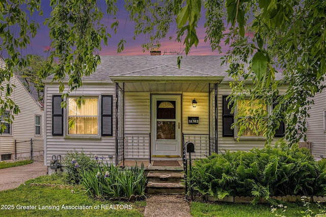 18762 Woodland St, Harper Woods, MI 48225 - view of front of house featuring a shingled roof