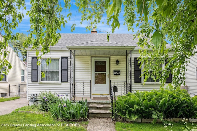 18762 Woodland St, Harper Woods, MI 48225 - bungalow-style home featuring a chimney and roof with shingles