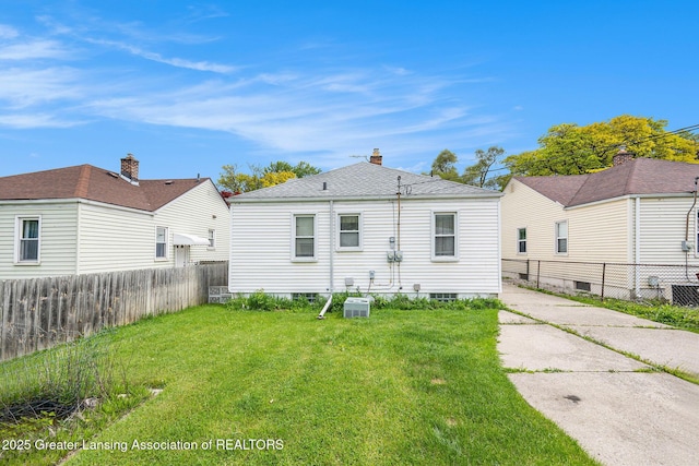 18762 Woodland St, Harper Woods, MI 48225 - back of property featuring roof with shingles