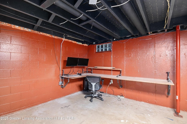 4415 Devonshire Ave, Lansing, MI 48910 - unfinished basement featuring concrete block wall