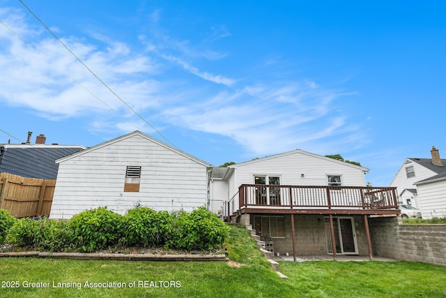 4415 Devonshire Ave, Lansing, MI 48910 - rear view of house featuring a wooden deck