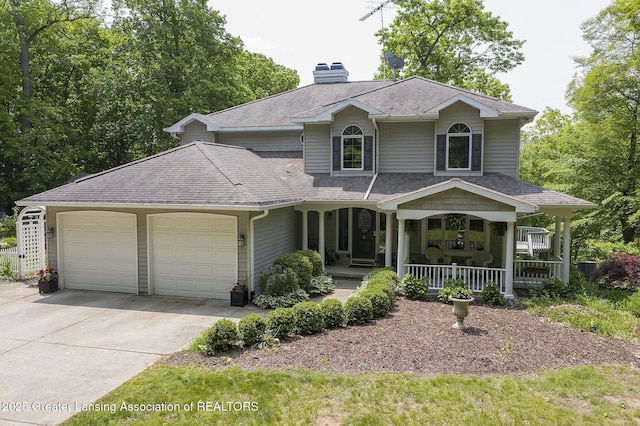 11781 W Herbison Rd, Eagle, MI 48822 - traditional home featuring covered porch, a chimney, a garage, concrete driveway, and roof with shingles