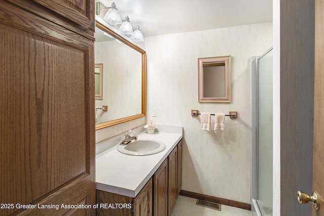 11781 W Herbison Rd, Eagle, MI 48822 - bathroom with vanity and a stall shower