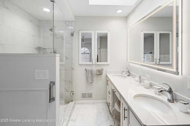 11781 W Herbison Rd, Eagle, MI 48822 - bathroom featuring a marble finish shower, double vanity, marble finish floors, baseboards, and recessed lighting