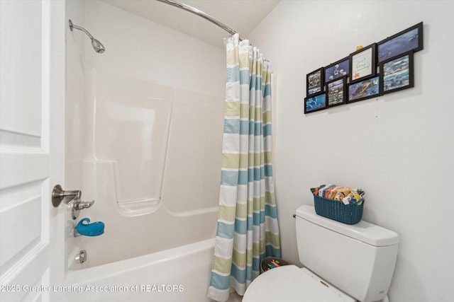 1058 Buckingham Rd, Haslett, MI 48840 - bathroom with shower / bath combination with curtain and toilet