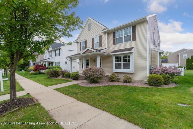2705 Tapestry Dr Unit 53, Okemos, MI 48864 - view of front facade with a front lawn