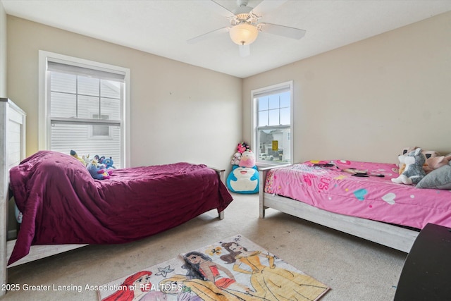 2705 Tapestry Dr Unit 53, Okemos, MI 48864 - bedroom with carpet and ceiling fan