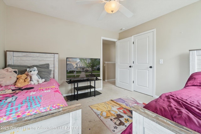2705 Tapestry Dr Unit 53, Okemos, MI 48864 - bedroom featuring a ceiling fan and carpet floors