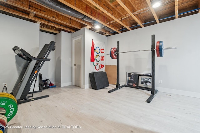 2705 Tapestry Dr Unit 53, Okemos, MI 48864 - exercise area with wood finished floors and baseboards
