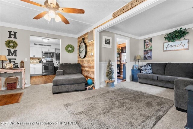 424 N Morrice Rd, Morrice, MI 48857 - living room featuring carpet floors, ceiling fan, and a textured ceiling