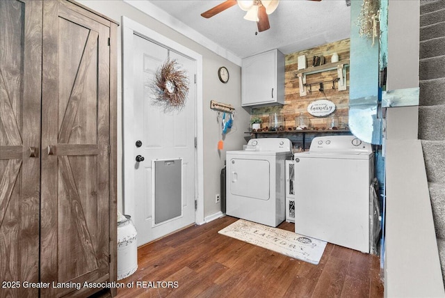 424 N Morrice Rd, Morrice, MI 48857 - laundry area featuring washer and clothes dryer, wood finished floors, cabinet space, and ceiling fan