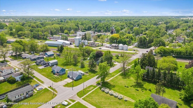 424 N Morrice Rd, Morrice, MI 48857 - aerial view of residential area featuring a heavily wooded area