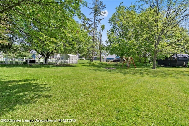 424 N Morrice Rd, Morrice, MI 48857 - view of yard with a playground