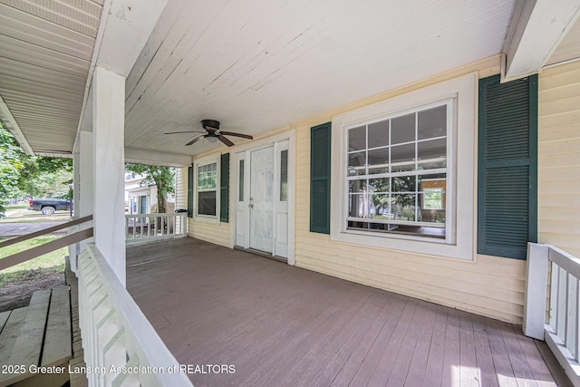 115 W Stephenson St, Morenci, MI 49256 - wooden porch with ceiling fan