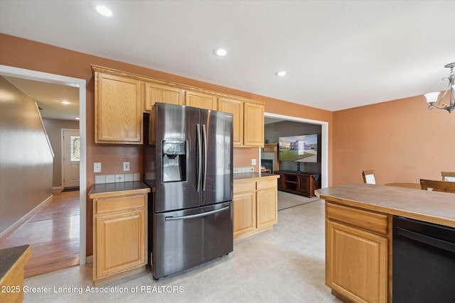 5619 Bittern Dr, Holt, MI 48842 - kitchen featuring stainless steel refrigerator with ice dispenser, a chandelier, dishwasher, light brown cabinetry, and recessed lighting