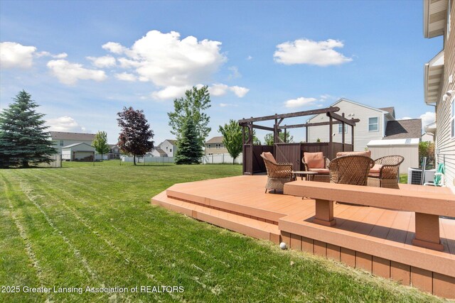 5619 Bittern Dr, Holt, MI 48842 - view of green lawn featuring a deck and a residential view