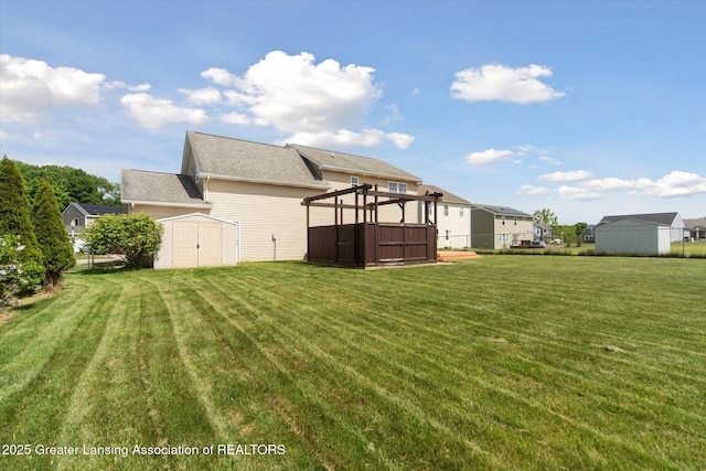 5619 Bittern Dr, Holt, MI 48842 - view of yard with a jacuzzi
