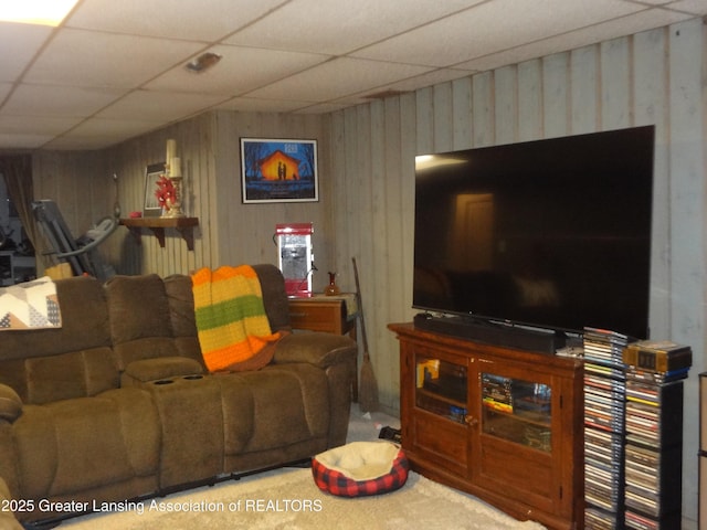 14311 Chandler Rd, Bath, MI 48808 - living area featuring carpet floors and a paneled ceiling