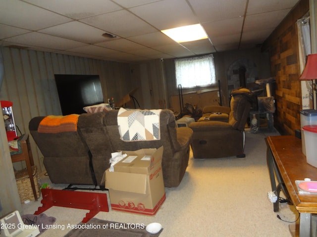 14311 Chandler Rd, Bath, MI 48808 - basement featuring a paneled ceiling and wooden walls